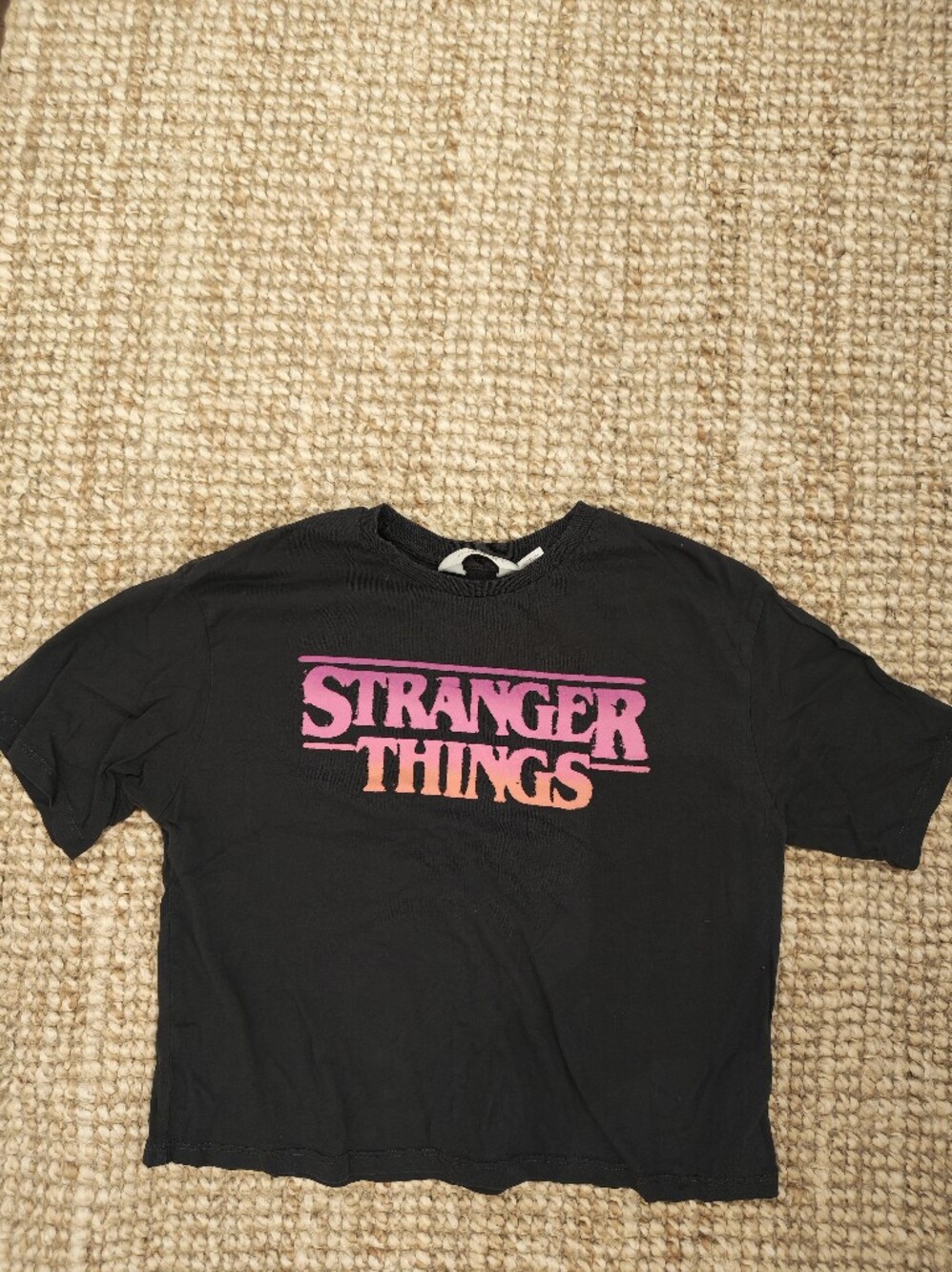 H&M Black "Stranger Things" Graphic Tee with Pink and Orange Logo